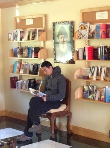 Jeremy reads one of the books at the visitors' center at the Most Holy Trinity Monastery in Petersham, Mass.